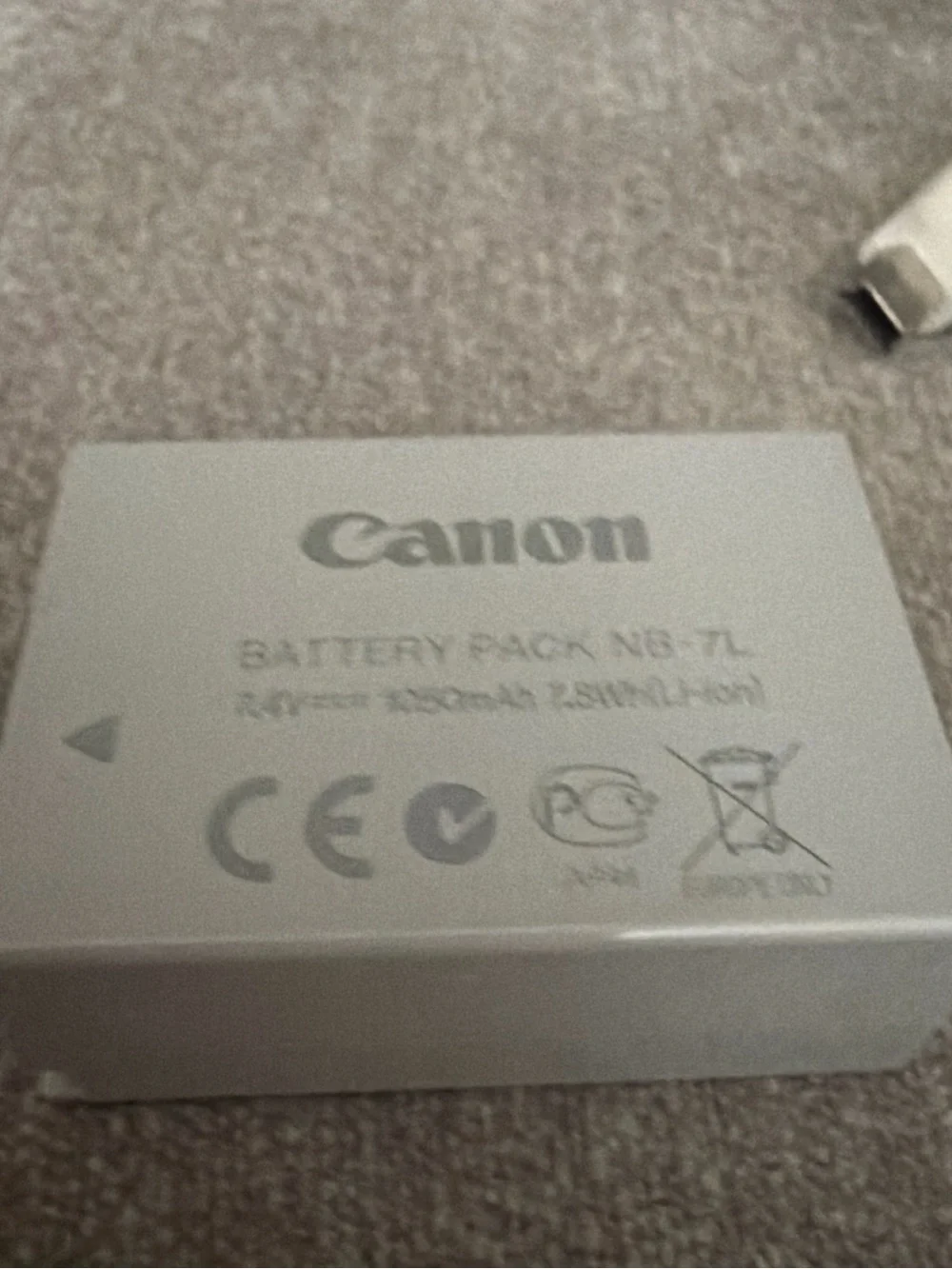 Canon Black Battery Charger with Silver LP-E12 Battery and White USB Cable